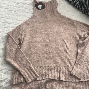 Pink turtleneck sweater